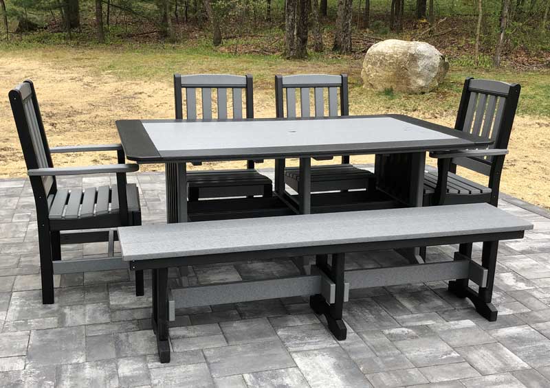 table with chair and benches on patio